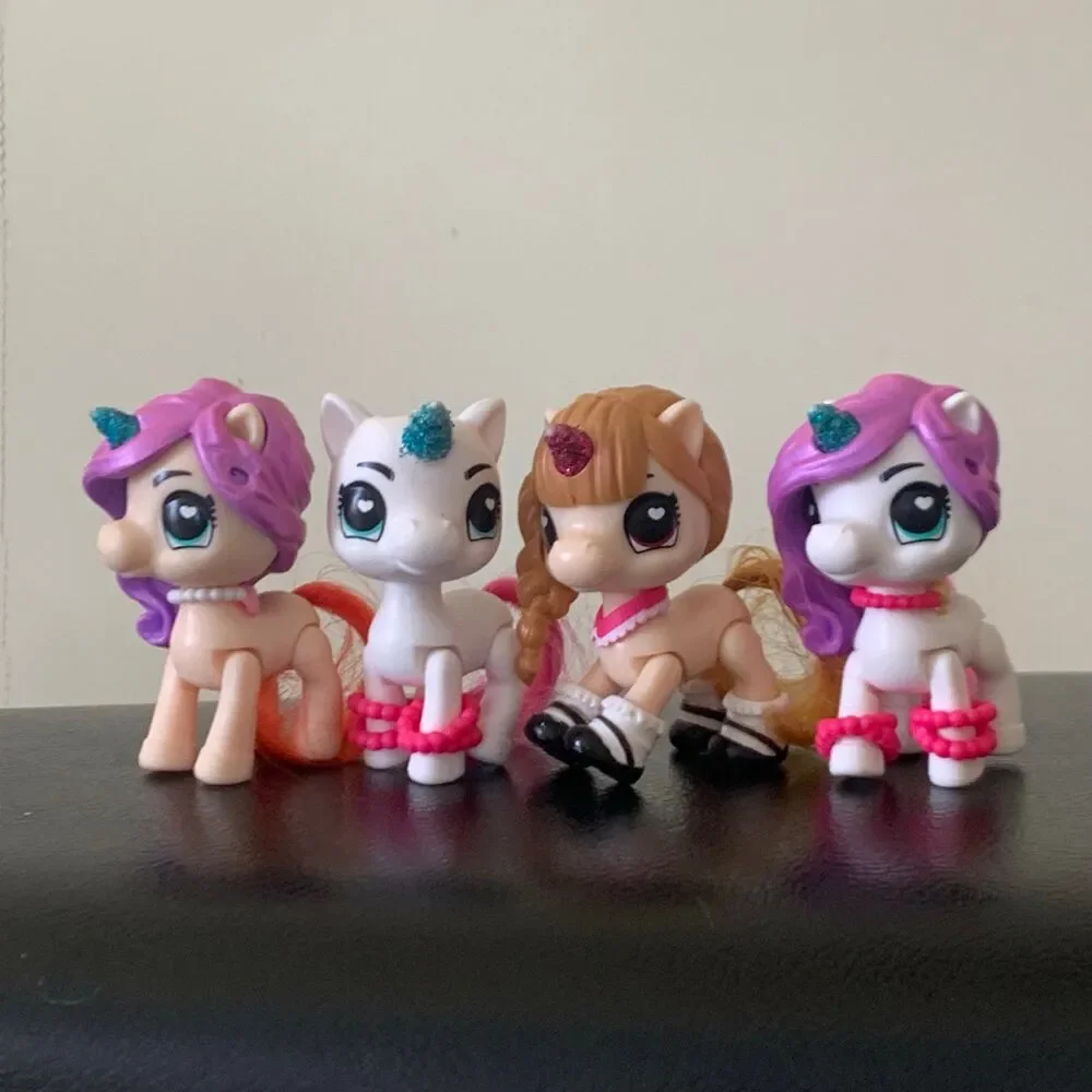 Lot of 4 zuru surprise unicorn squad toy